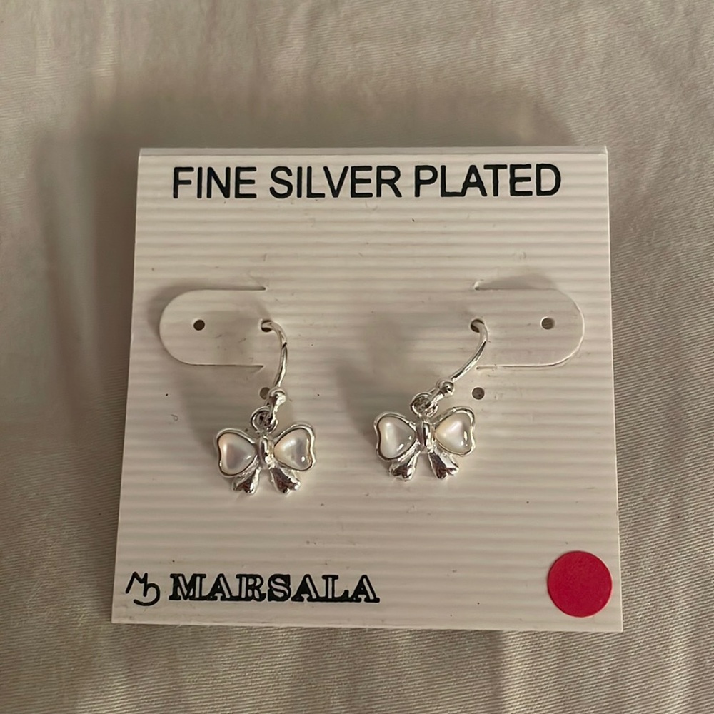 Never worn brand new Marsala bow earrings